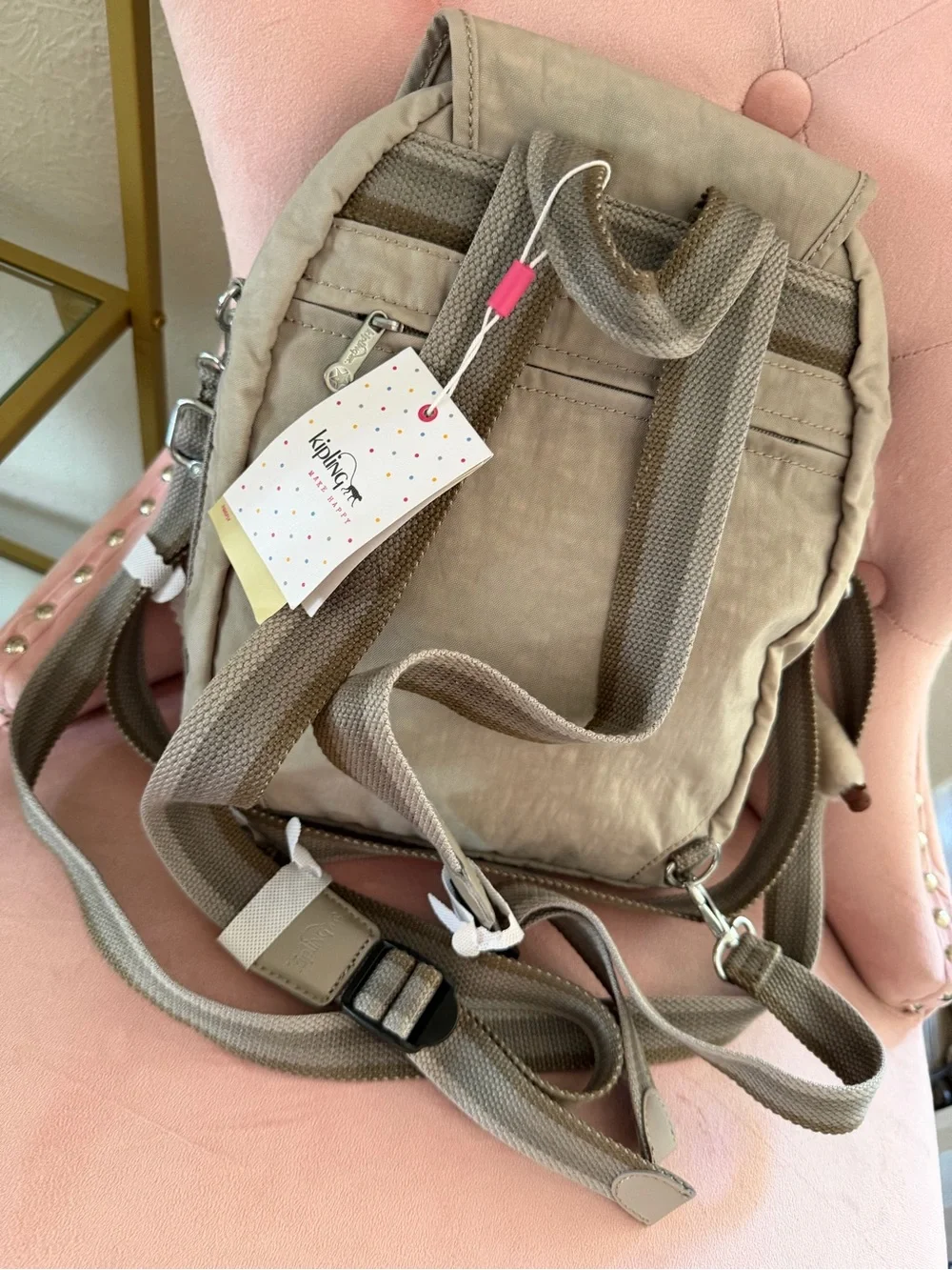 The Kipling Firefly Up Convertible Backpack